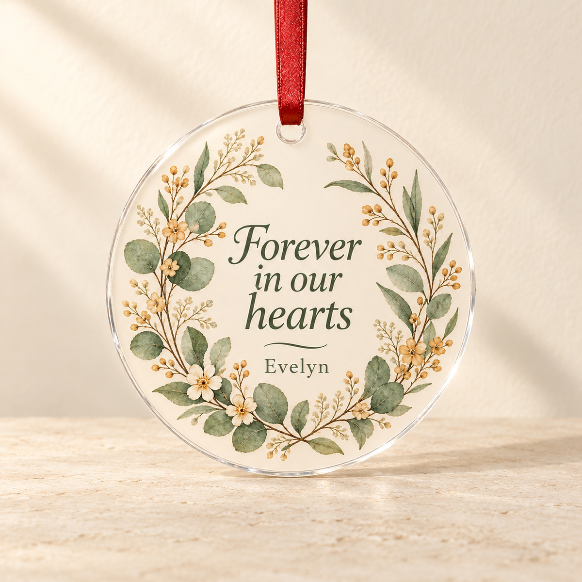 Personalized acrylic memorial ornament example for Evelyn with red ribbon